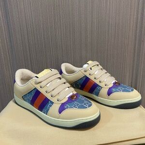 Gucci Cream Sneakers with Purple & Orange Stripe Accents